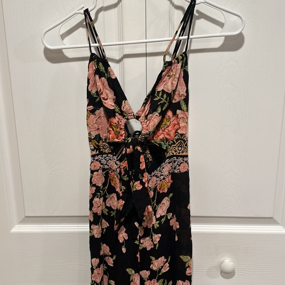 FREE PEOPLE SUNDOWN CUTOUT WIDE LEG FLORAL PRINTED JUMPSUIT - Picture 6 of 7